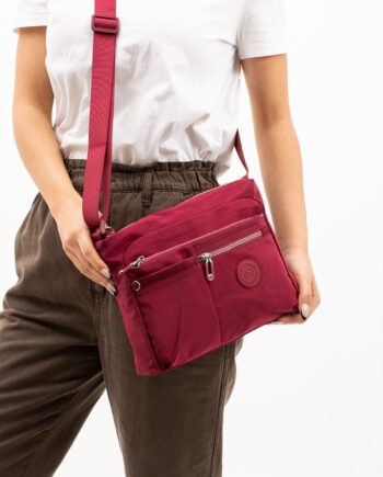 Sanmorris multi-pocket water-resistant krinkled fabric crossbody bag, showcasing its various compartments and stylish design.