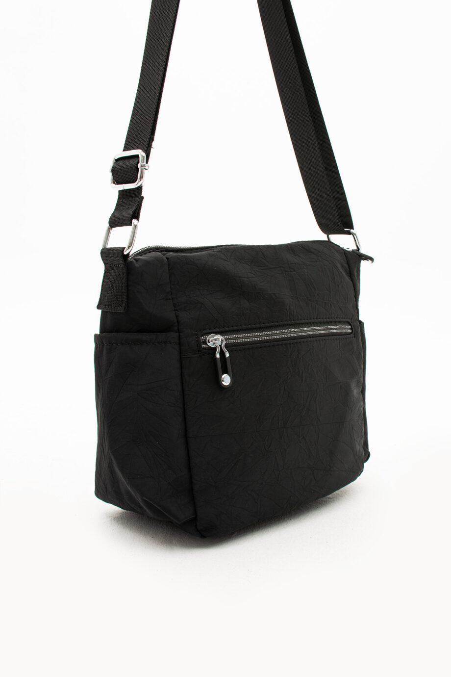 Side view of the Sanmorris crossbody bag showcasing the adjustable strap and high-quality materials used in its construction.