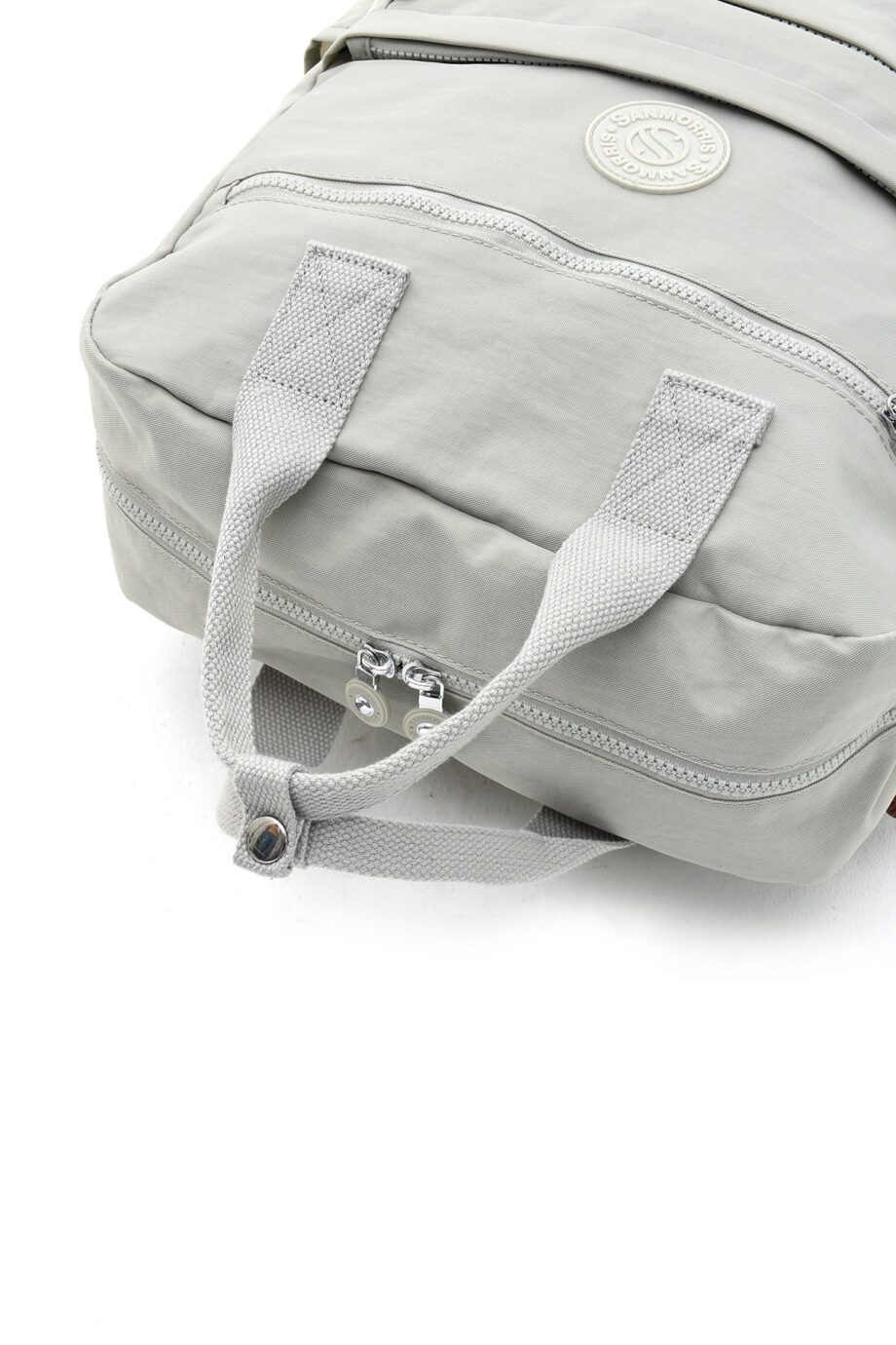 Close-up of the durable waterproof fabric used in the Sanmorris backpack