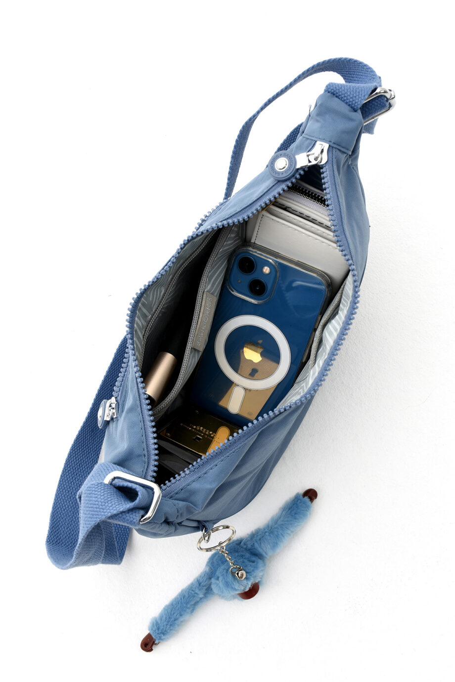 Interior view of the Sanmorris bag showcasing multiple compartments for easy organization of small items.